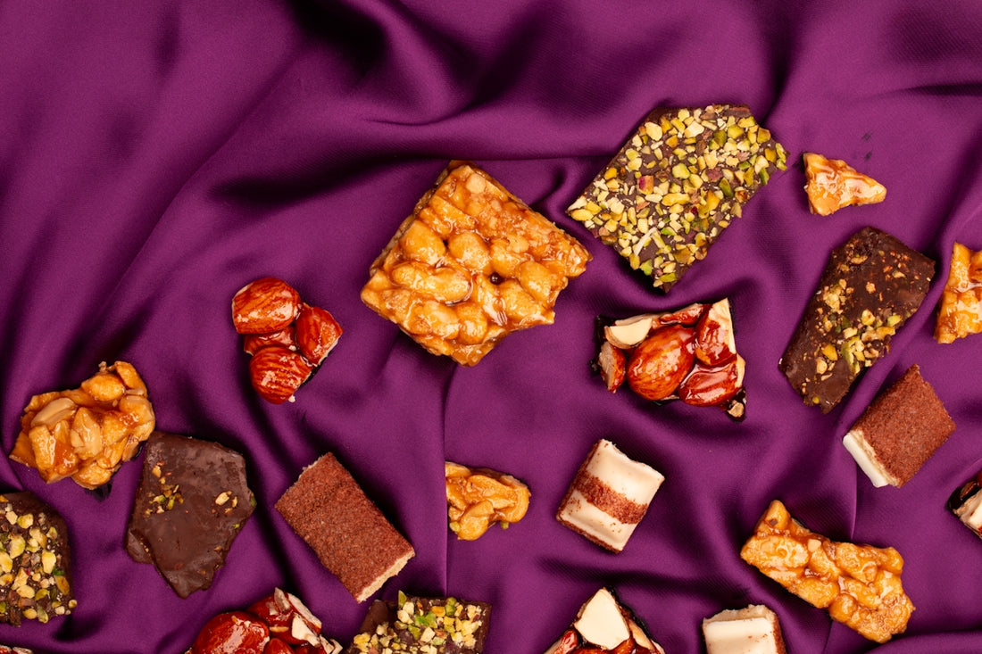 Assortment of sweet treats on purple fabric