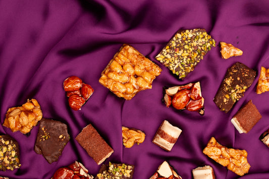 Assortment of sweet treats on purple fabric