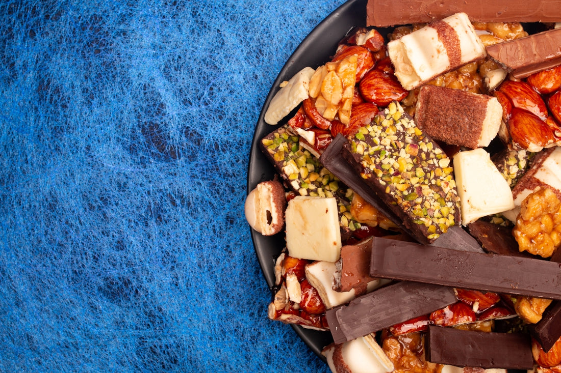 A close-up of a variety of chocolate bars and snacks.