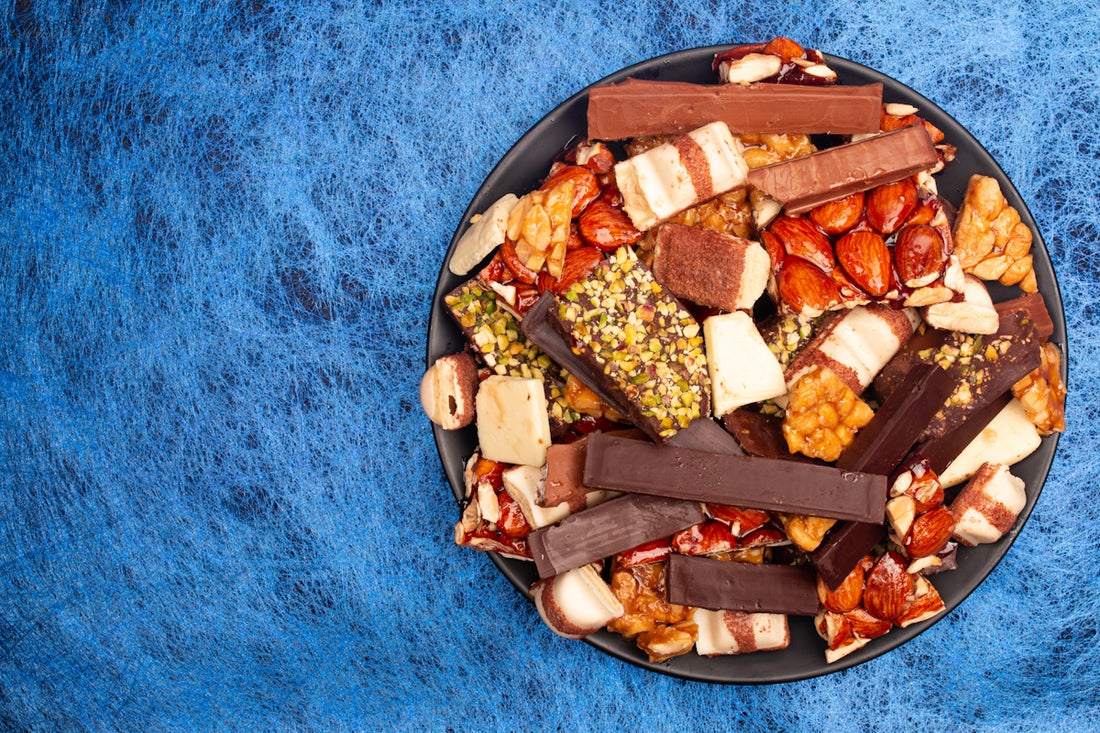 A plate of assorted chocolates and snacks