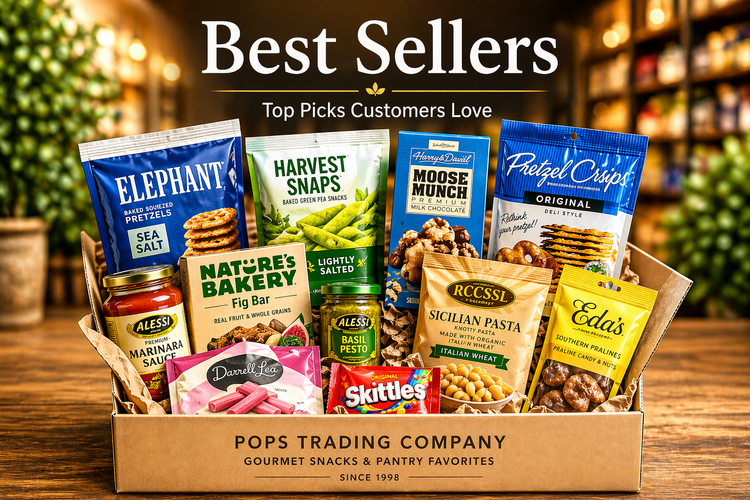 Best selling snacks and pantry foods including Nature’s Bakery fig bars, Harvest Snaps, pretzels, pasta, and gourmet treats in a gift box display