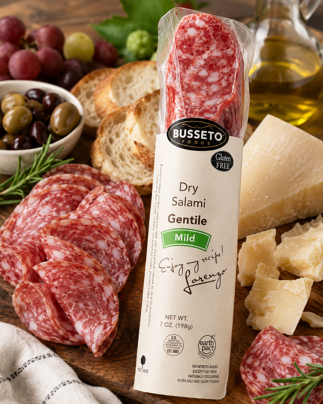 Busseto Mild Gentile Dry Salami served with cheese fruit crackers and breadsticks on a charcuterie board