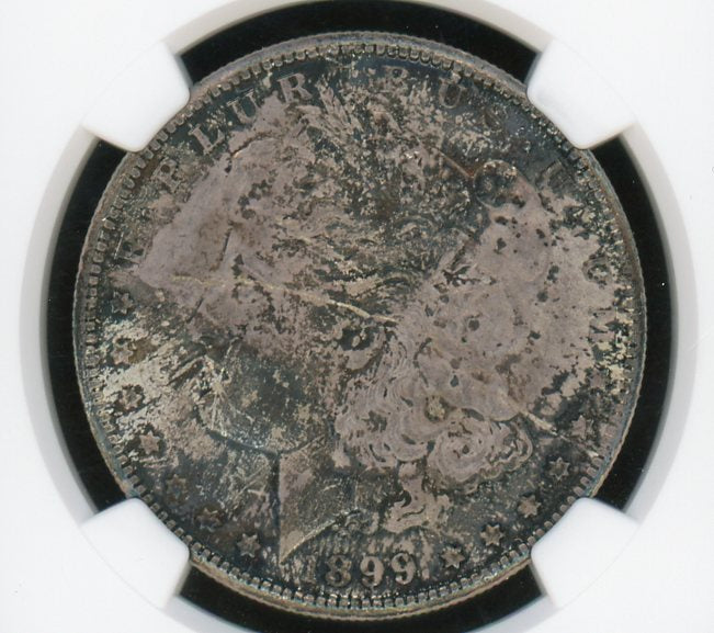 1899-O Morgan Silver Dollar NGC UNC Details Environmental Damage Certified Coin 014 product image - Pops Trading Company
