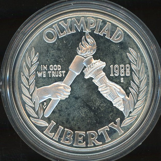1988 Olympic silver dollar commemorative coin torch and Olympic rings design obverse and reverse